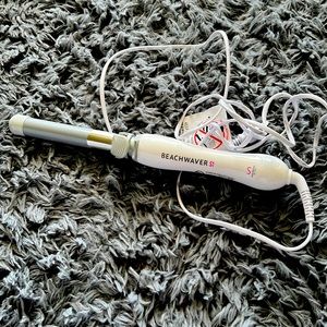 Beach waiver curling iron brand-new used one time.